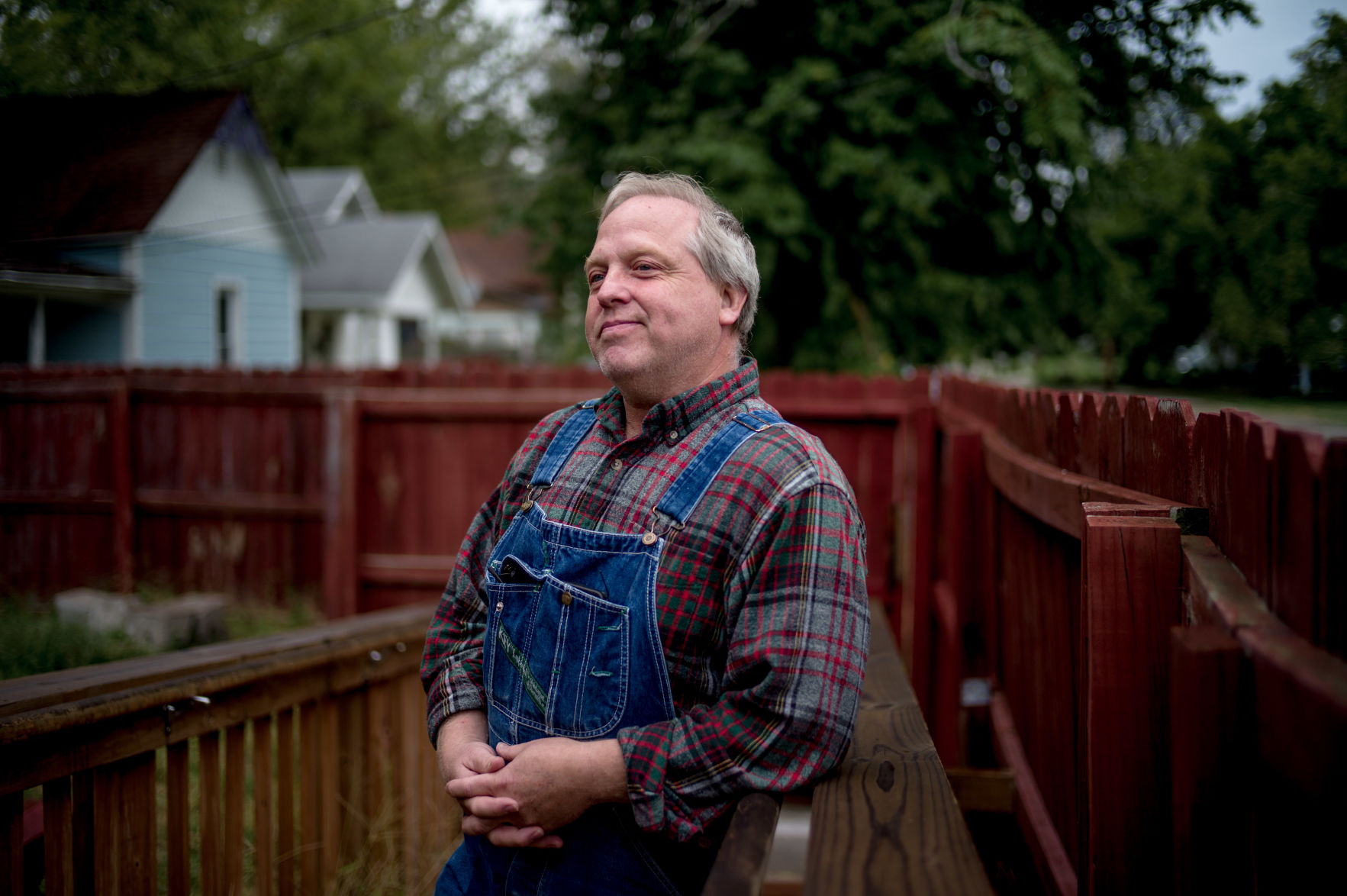 Hutton stands outside The Center Project for a portrait